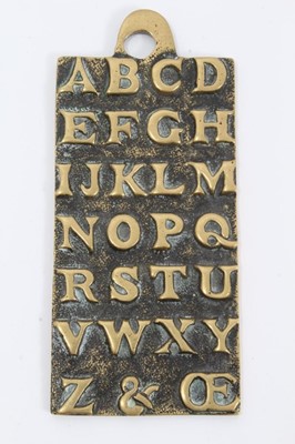 Lot 968 - 18th century style brass alphabet plaque