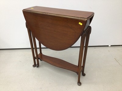 Lot 21 - Mahogany oval Sutherland table on turned legs, 61cm opening to 83cm x 68cm high