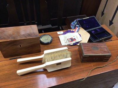 Lot 43 - Dressing table items, including a pair of ivory brushes, three boxes, a pocket calendar and embroidered badges