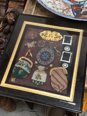 Lot 45 - Unusual framed display of Victorian objects, including beadwork purses, buckles, brooches and spectacles, 41cm x 36cm