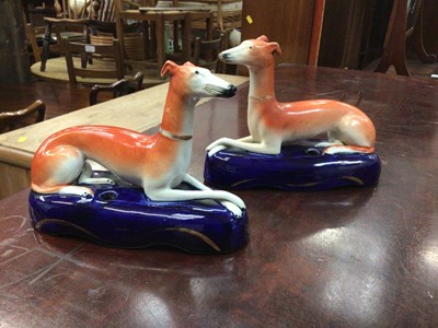 Lot 110 - Pair of Victorian Staffordshire greyhound inkwells, 16.5cm across