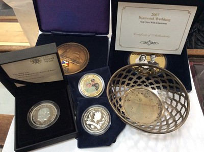 Lot 709 - Pierced silver dish, together with Commemorative coins including Prince of Wales £5 silver proof coin in box