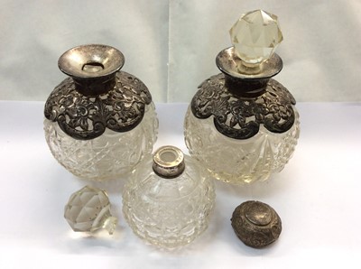 Lot 718 - Group of silver mounted scent bottles and silver and tortoiseshell brushes and mirrors