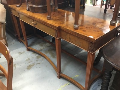 Lot 1028 - Georgian -style yew break front serving table with three drawers on taper legs 198 cm