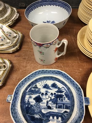Lot 281 - Late 18th century Chinese Famille Rose porcelain tankard of cylinderical form,  18th century Chinese export porcelain bowl and a similar warming plate (3)