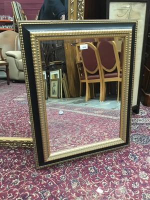 Lot 1034 - Gilt and ebonised wall mirror 76 x 61 cm