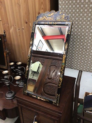 Lot 395 - 1920s lacquered chinoiserie mirror, 62.5cm x 29cm, and a pair of candlesticks