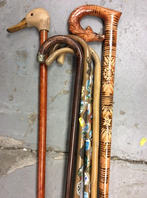 Lot 372 - Group of walking sticks to include one in the form of a Ducks head