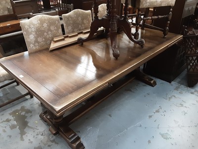 Lot 1040 - Large oak drawer leaf refectory table on cup and cover end standards