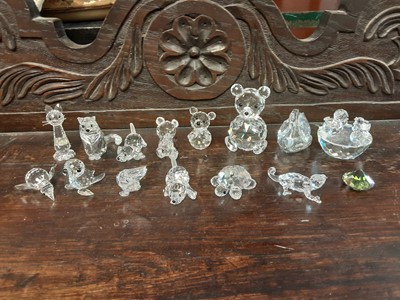 Lot 574 - Collection of Swarovski crystal animals including lady bird, teddy bears, young girl, penguins atc. mostly boxed plus some spare boxes (qty)