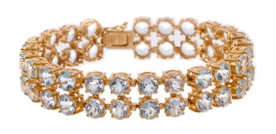 Lot 575 - 9ct gold aquamarine double row bracelet