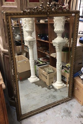 Lot 403 - Large bevelled wall mirror in gilt frame with carved scroll cresting H152xW96cm