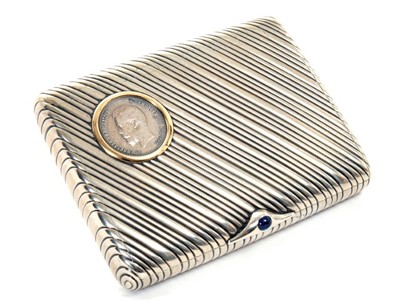 Lot 8 - Fine Imperial Russian silver cigarette case with inset 25 Rubel coin dated 1896 with gold framed mount, slanting ribbed decoration with blue cabochon button , 84 silver mark and Petrograd zolotnik...