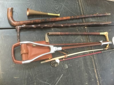 Lot 136 - Antique hunting horn by Swaine and Adeney, 185 Piccadilly, together with whips and walking sticks