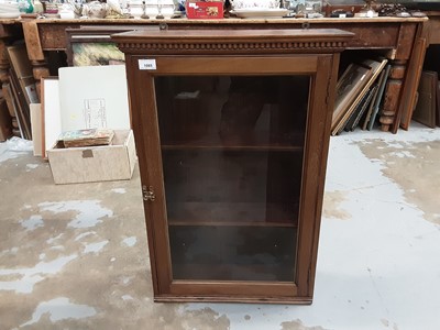 Lot 1085 - Oak hanging cabinet with shelved interior enclosed by glazed door