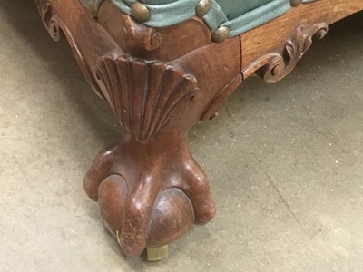 Lot 1415 - Good quality Howard & Sons low armchair, upholstered in blue/green leather with loose seat, on carved cabriole legs and claw and ball feet terminating on brass castors, the rear leg stamped 1238. 2...