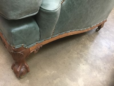 Lot 1415 - Good quality Howard & Sons low armchair, upholstered in blue/green leather with loose seat, on carved cabriole legs and claw and ball feet terminating on brass castors, the rear leg stamped 1238. 2...