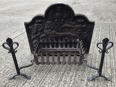Lot 1449 - Cast iron fire back, fire basket and firedogs