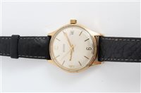 Lot 3258 - Gold (9ct) Garrard Automatic wristwatch on...