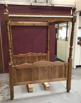 Lot 380 - Victorian-style pine four poster bedstead with turned columns and slatted base, 5'1" wide