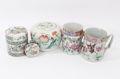 Lot 115 - Small collection of 19th century Chinese porcelain, including two famille rose tankards, a jar and cover, a famille verte pot and cover, and a snuff bottle (5)