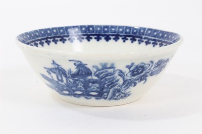 Lot 119 - Late 18th century English blue and white porcelain patty pan, probably Caughley, printed with two Chinoiserie scenes, pattern inside the rim, 9.75cm diameter
