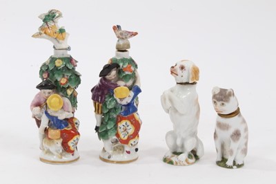Lot 122 - Four continental porcelain scent bottles, including a pair of Samson figural examples, a cat and a dog
