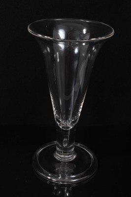 Lot 131 - Early/mid 19th century oversized trumpet ale glass with air twist stem, and a similar glass with tear stem, 20cm and 24cm high