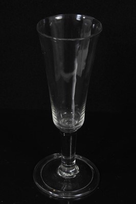 Lot 132 - Seven Georgian drinking glasses, including an air twist stem glass, three plain stem, two faceted stem  and one with an etched bowl, 12cm to 18.5cm high