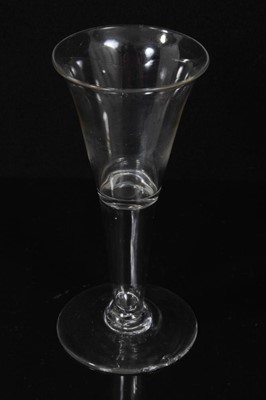 Lot 132 - Seven Georgian drinking glasses, including an air twist stem glass, three plain stem, two faceted stem  and one with an etched bowl, 12cm to 18.5cm high