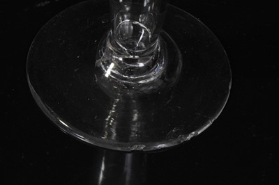 Lot 132 - Seven Georgian drinking glasses, including an air twist stem glass, three plain stem, two faceted stem  and one with an etched bowl, 12cm to 18.5cm high