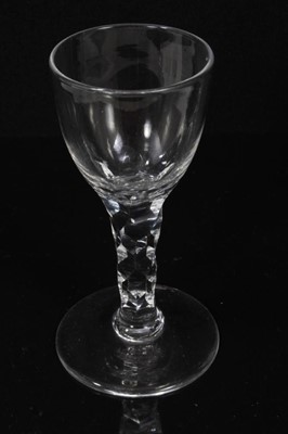Lot 132 - Seven Georgian drinking glasses, including an air twist stem glass, three plain stem, two faceted stem  and one with an etched bowl, 12cm to 18.5cm high
