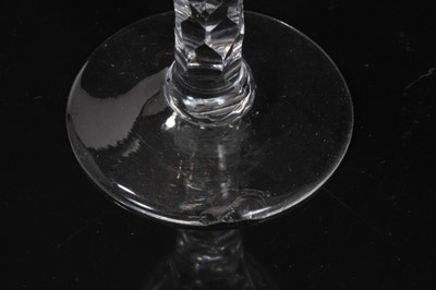 Lot 132 - Seven Georgian drinking glasses, including an air twist stem glass, three plain stem, two faceted stem  and one with an etched bowl, 12cm to 18.5cm high
