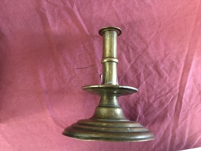 Lot 979 - Rare 17th century brass trumpet form candlestick
