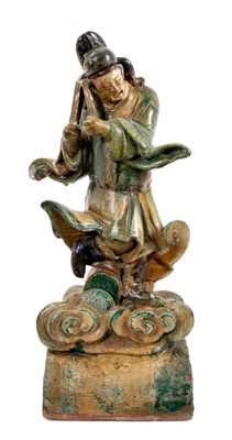 Lot 162 - Large Chinese figural pottery roof tile, Qing period, with Sancai-style green and yellow glaze, 46.5cm high