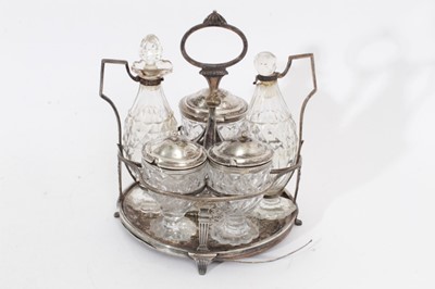 Lot 500 - George III silver cruet stand with five matching bottles