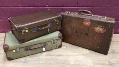 Lot 321 - Three vintage suitcases to include a brown leather case with Cunard White Star labels