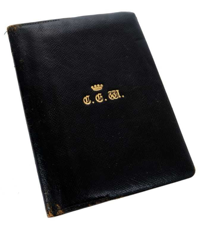 Lot 21 - Good quality Victorian black leather writing wallet containing two dip pens, retailed by Clark, 20 Old Bond Street, with gilt Barons coronet and initials to cover.