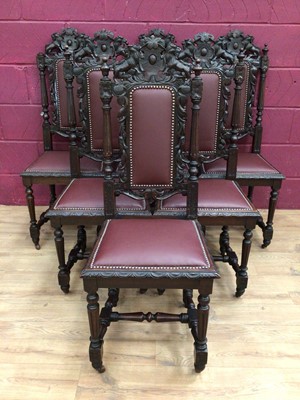 Lot 366 - Set of six late Victorian carved oak dining chairs