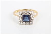 Lot 3262 - Gold (18ct) sapphire and diamond ring with a...