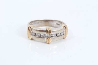 Lot 57 - 9ct white gold seven stone diamond ring