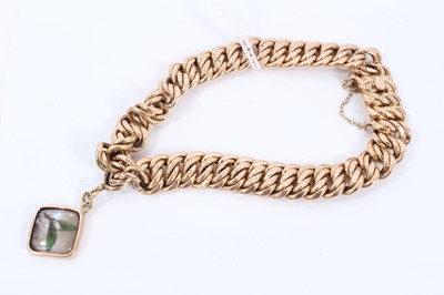 Lot 72 - Early 20th century continental 14ct gold link bracelet with one charm