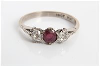 Lot 3263 - White gold (18ct) ruby and diamond three stone...