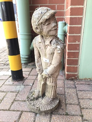 Lot 58 - Concrete garden ornament of a boy playing cricket 66cm high