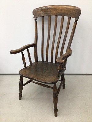 Lot 26 - Lalh back kitchen elbow chair and one other elbow chair with cane back and blue upholstered seat (2)