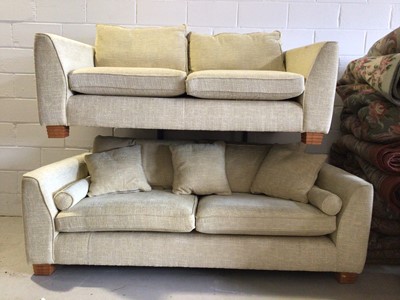 Lot 63 - Contemporary three piece suite with pale yellow upholstery comprising a pair of two seater settees 218 cm wide x 100cm deep and an armchair