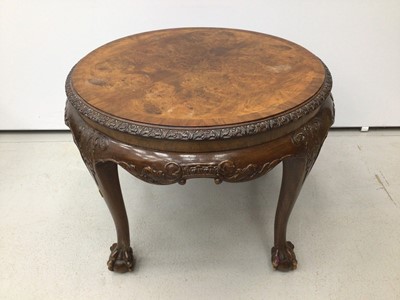 Lot 33 - walnut veneered circular coffee table, Edwardian mahogany tow tier table and an oak revolving bookcase (3)