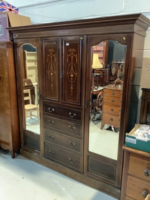 Lot 82 - Edwardian inlaid mahogany wardrobe with two central panelled doors and four draws below flanked by two bevelled mirrored doors 193.5cm wide x 203cm high