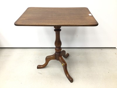 Lot 45 - 19th century mahogany wine table with tilt top on turned column and three hipped splayed legs 66.5cm wide x 46cm