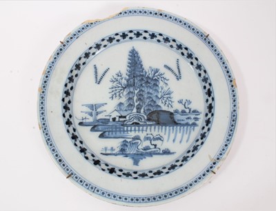 Lot 184 - 18th century English delftware charger, painted in underglaze blue with an island pattern, 34.5cm diameter